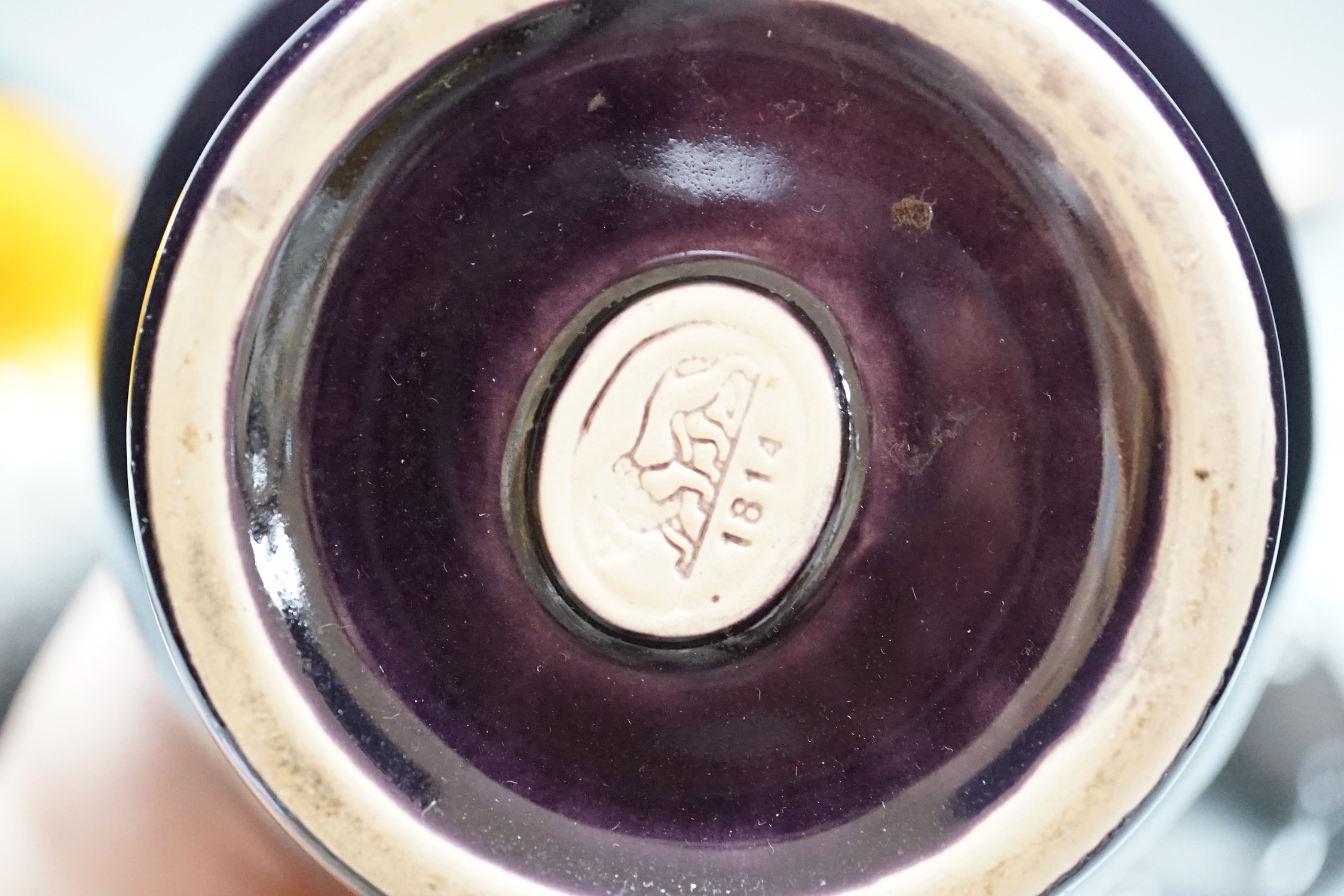 A Copenhagen porcelain seal, a Canadian pottery bull and two German vases tallest 21.5cm